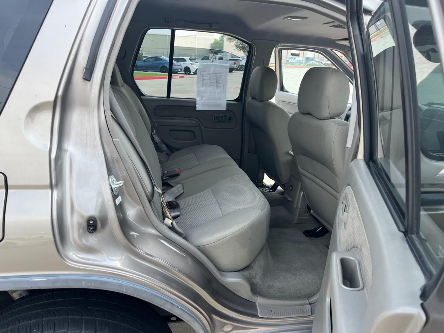 2004 GOLD /gray Nissan Xterra (5N1ED28T84C) , Automatic transmission, located at 14700 Tomball Parkway 249, Houston, TX, 77086, (281) 444-2200, 29.928619, -95.504074 - Photo#12